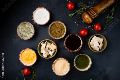 Sour cream sauce, cheese sauce, garlic sauce, pickled cucumber and dill sauce, Brie cheese, Tkemali sauce from green plums, Dorblu cheese or blue mold cheese, Green sauce and soy sauce