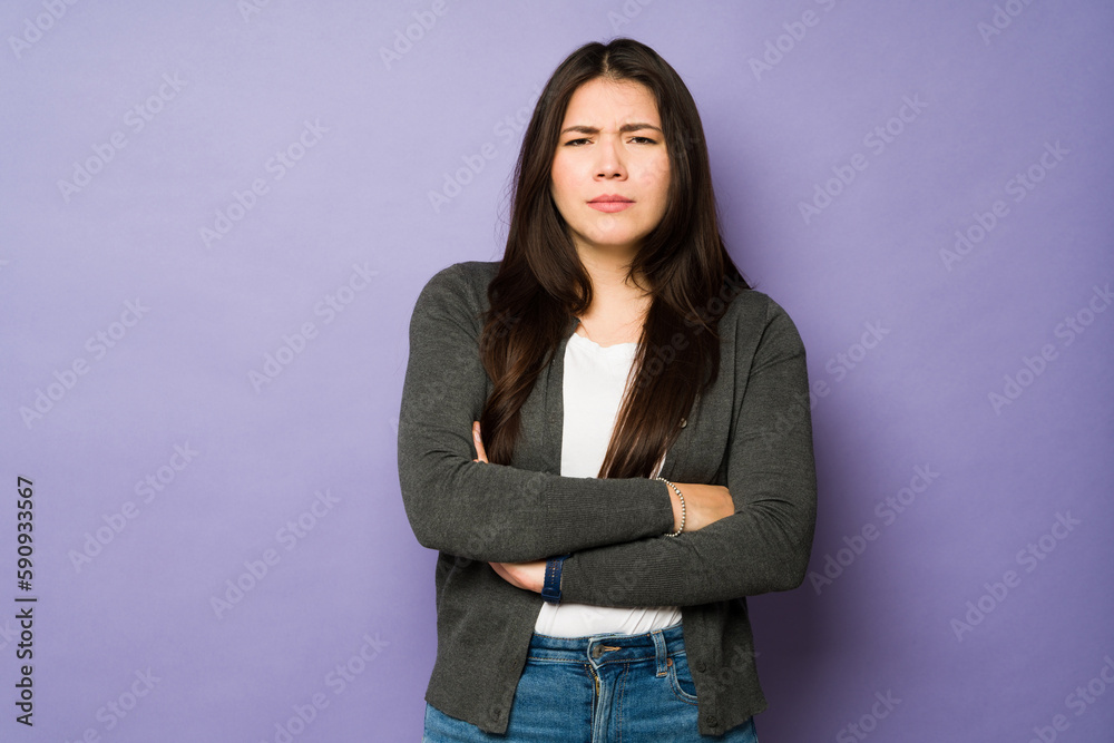Stressed woman looking angry and arguing Stressed woman looking angry and arguing