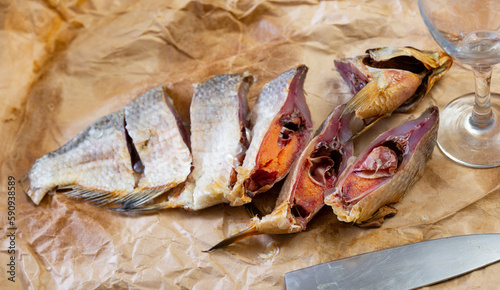 Delicious salted and dried bream laid out nicely as snack photo