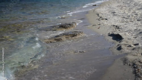 Wallpaper Mural Small relaxing waves on the shore of the beach. Torontodigital.ca