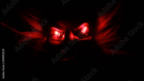 Jump scare video. Scary witch eyes in dark.