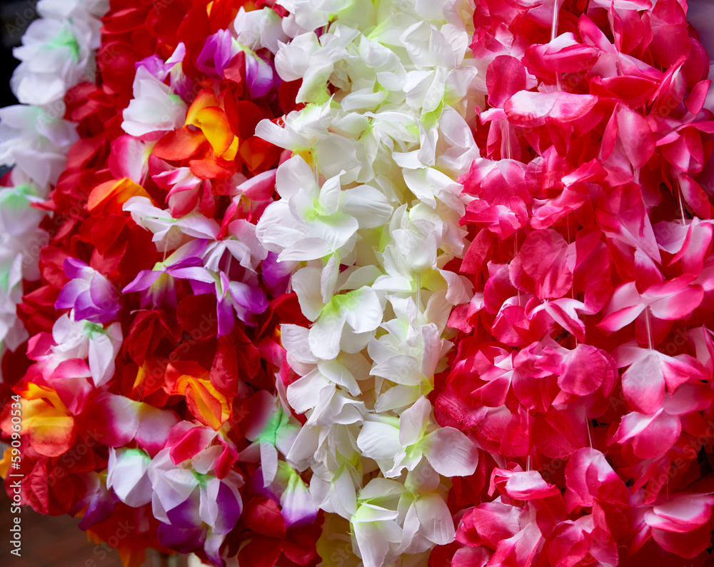 Artificial Flower Garlands hanging on a Rack Artificial Flower Garlands hanging on a Rack