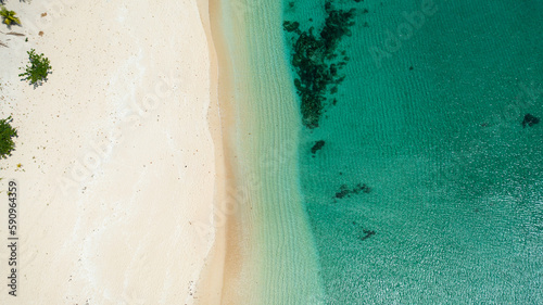 Beautiful sandy beach and ocean with waves. Pagudpud, Ilocos Norte Philippines