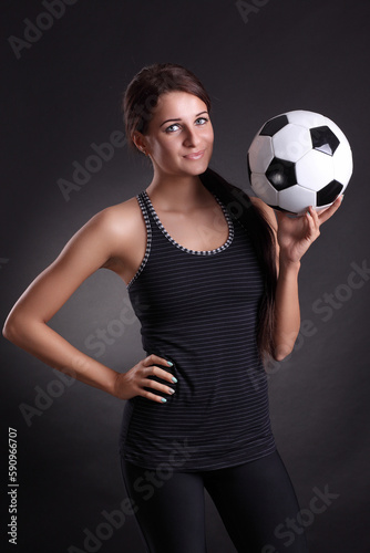 young woman with soccer ball