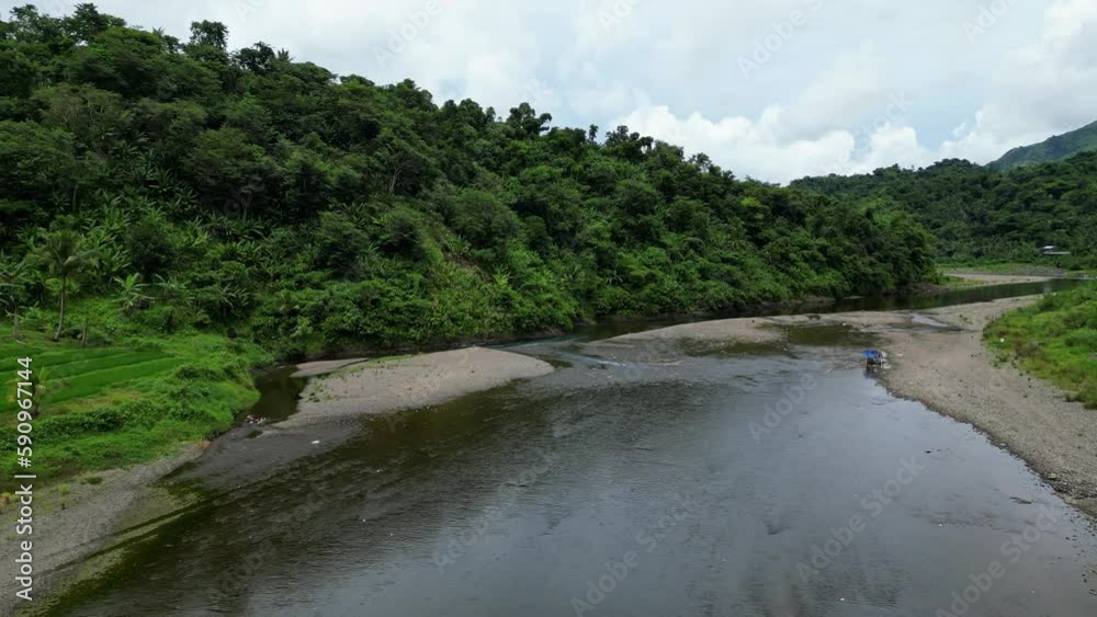 Overhead Drone Shot of Quaint Shallow River in tropical rainforest island of Catanduanes. Overhead Drone Shot of Quaint Shallow River in tropical rainforest island of Catanduanes.