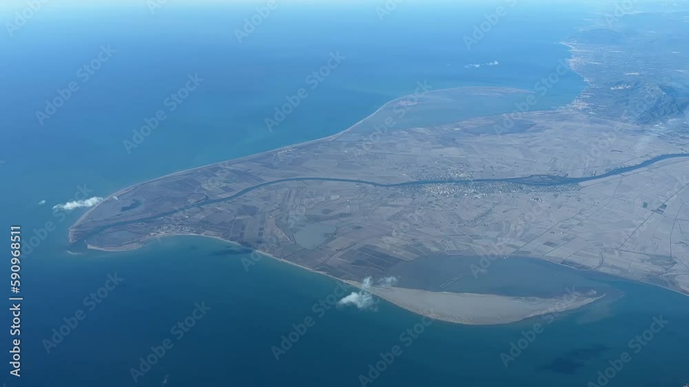 Aerial view of Delta del Ebro, in NE Spain, from a jet cockpit flying at 11000m high. Pilot’s point of view. Aerial view of Delta del Ebro, in NE Spain, from a jet cockpit flying at 11000m high. Pilot’s point of view.