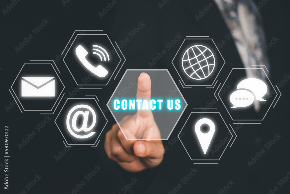 Contact us concept, Business person hand touching contact icon on virtual screen. Contact us concept, Business person hand touching contact icon on virtual screen.