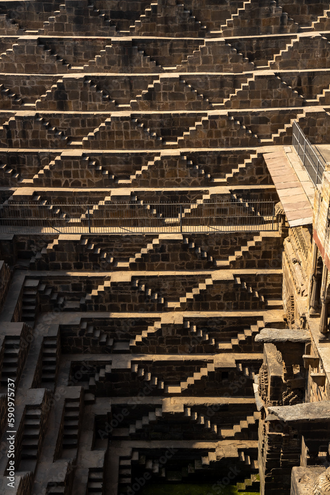 Ancient Indian step well in Jaipur, India, Architecture of stairs at Abhaneri Baori step well in Jaipur, Rajasthan, India. Ancient Indian step well in Jaipur, India, Architecture of stairs at Abhaneri Baori step well in Jaipur, Rajasthan, India.