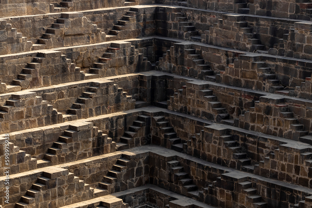 Ancient Indian step well in Jaipur, India, Architecture of stairs at Abhaneri Baori step well in Jaipur, Rajasthan, India. Ancient Indian step well in Jaipur, India, Architecture of stairs at Abhaneri Baori step well in Jaipur, Rajasthan, India.