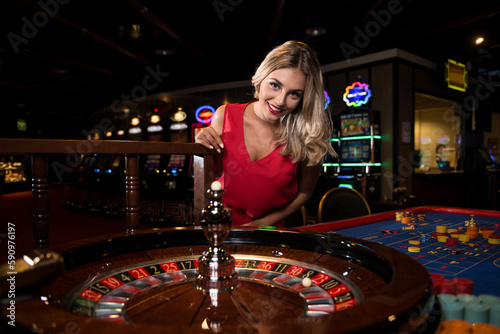 Portrait of a Woman Behind Roulette Table Casino