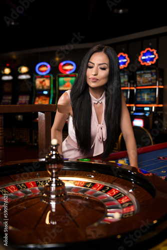 Portrait of a Woman Behind Roulette Table Casino
