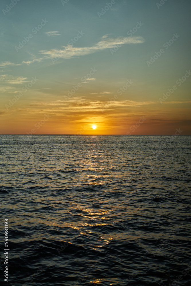 Sunset offshore in the Pacific Ocean