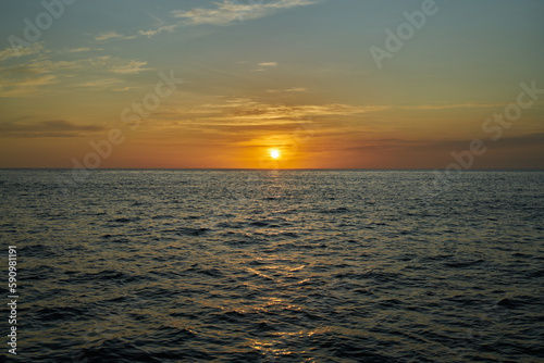 Sunset offshore in the Pacific Ocean