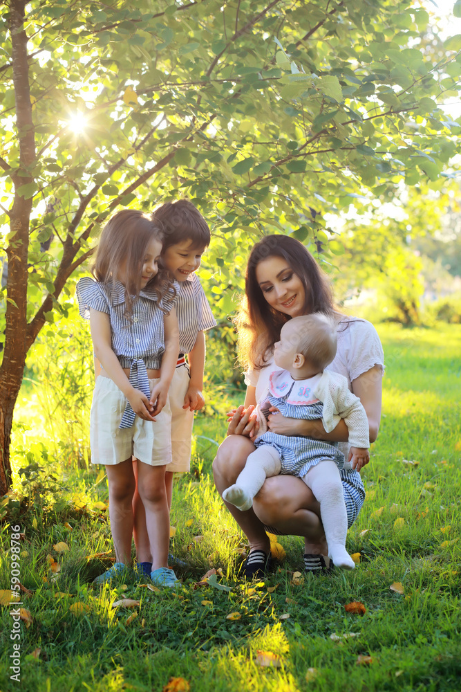 Children on a walk in the summer. Children indulge in the country. Laughter and splashing water. Children on a walk in the summer. Children indulge in the country. Laughter and splashing water.