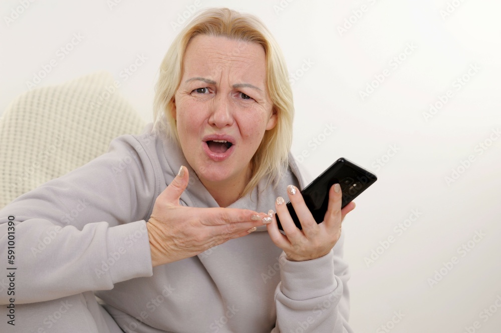 angry woman screaming Screaming, hate, rage. Crying emotional angry woman screaming Female half-length portrait. Human emotions in hands with a phone a bad conversation angry woman screaming Screaming, hate, rage. Crying emotional angry woman screaming Female half-length portrait. Human emotions in hands with a phone a bad conversation