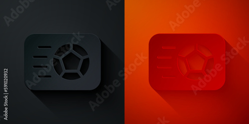 Paper cut Soccer football ball icon isolated on black and red background. Sport equipment. Paper art style. Vector