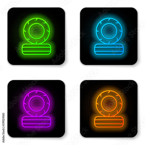 Glowing neon line Lying burning tires icon isolated on white background. Black square button. Vector