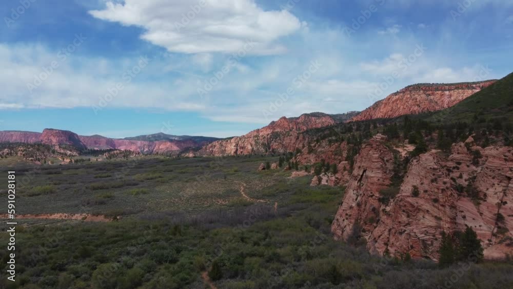 Geological Red Cliffs Of Zion National Park In Utah, United States. Aerial Wide Shot Geological Red Cliffs Of Zion National Park In Utah, United States. Aerial Wide Shot