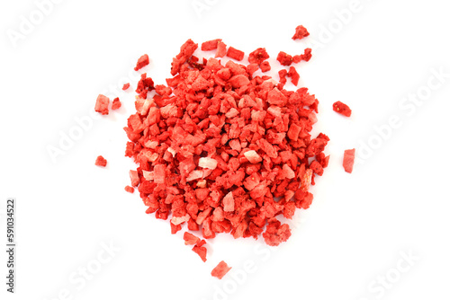 Strawberries on white background. Strawberries texture. dehydrated, dried Strawberry pieces, coarse cuts, chips. Heap of freeze dried strawberries. sweet fruit background. Red background stock image.