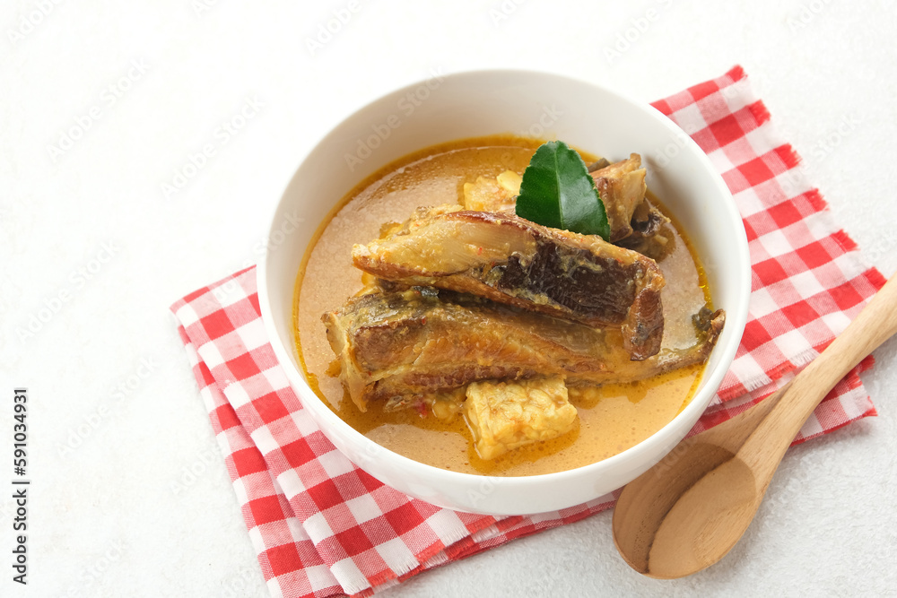 Mangut, made from smoked stingray fish cooked with spices and coconut milk. Indonesian traditional food.
