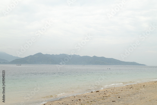 Lombok and Gili Air islands  overcast  cloudy day  sky and sea. Sunny day  sand beach.