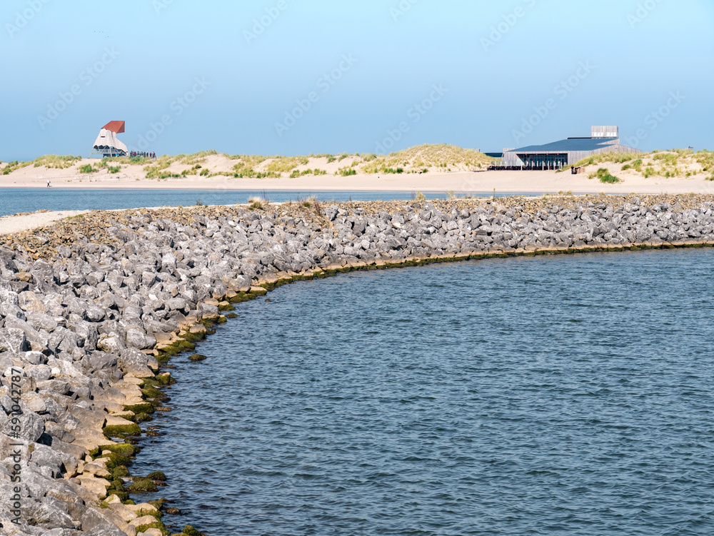 Breakwater and beach on coast of Marker Wadden island in Markermeer lake, Netherlands
