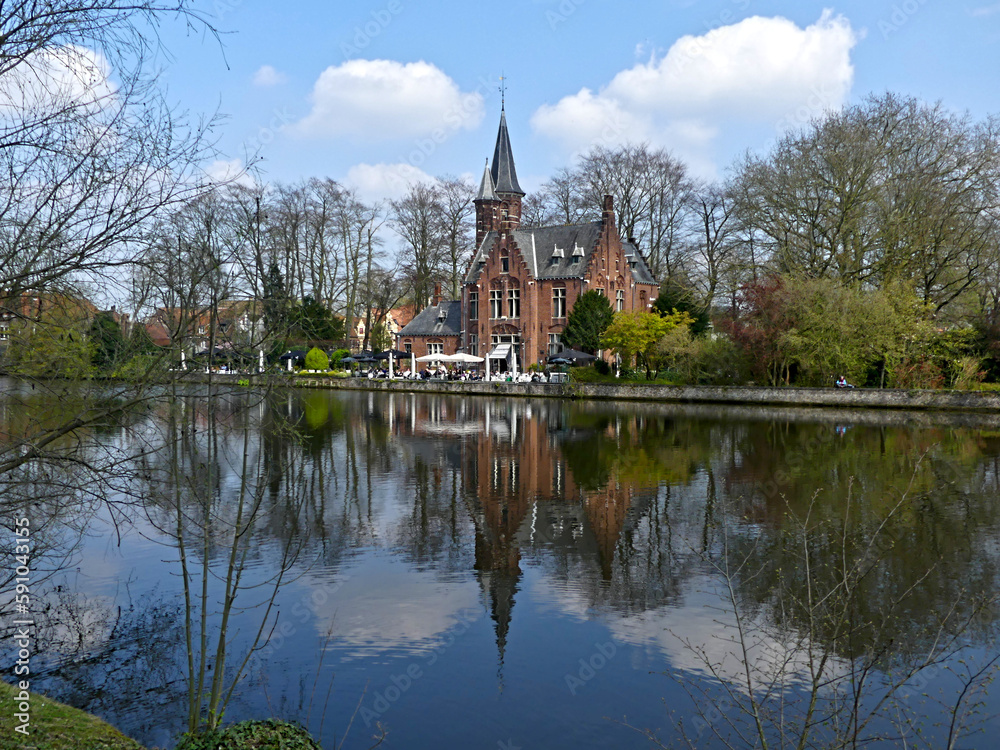 Bruges, April 2023: Magnificent facades of the buildings of Bruges, the Venice of the North