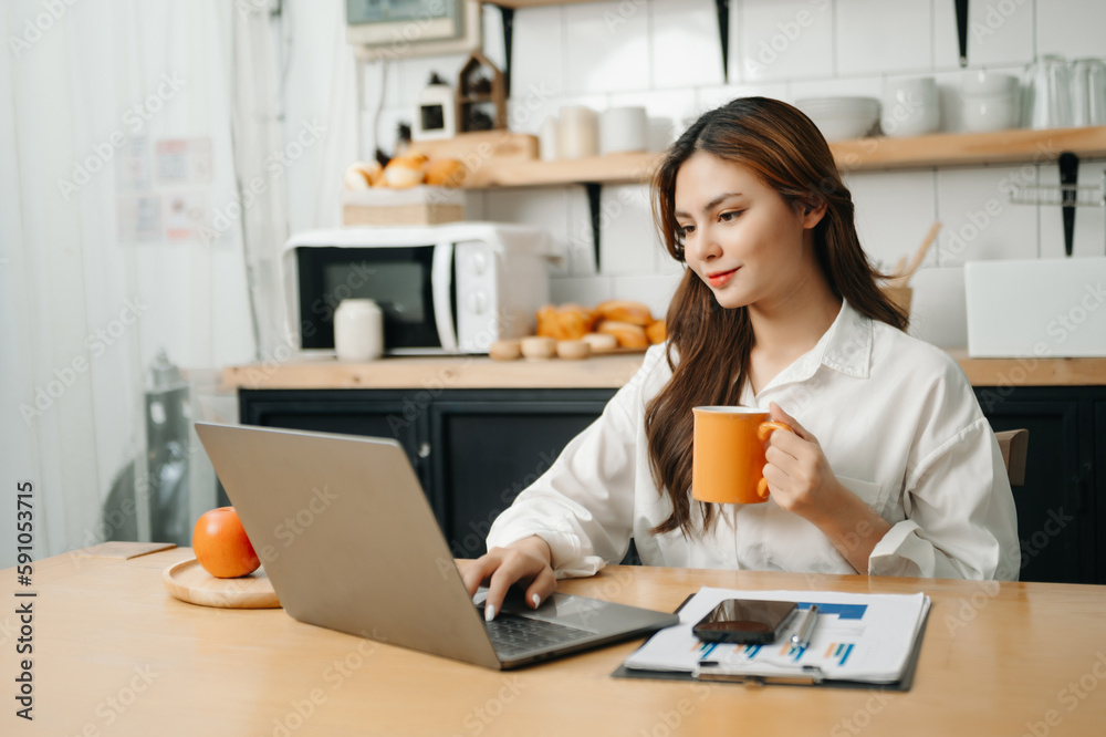 Portrait of female office businesswoman startup daydreaming about her work, startup and working with laptop on office desk Portrait of female office businesswoman startup daydreaming about her work, startup and working with laptop on office desk