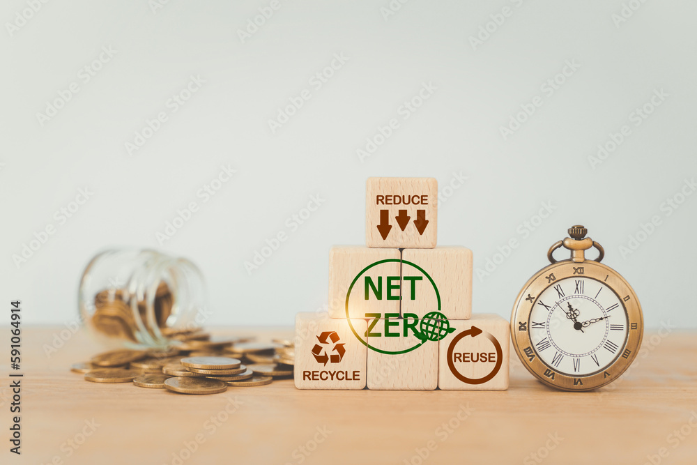 Carbon neutral and net zero concept, natural environment strategy, greenhouse gas emissions targets. Wooden block with green net zero icon and reduce recycle reuse with copy space Carbon neutral and net zero concept, natural environment strategy, greenhouse gas emissions targets. Wooden block with green net zero icon and reduce recycle reuse with copy space