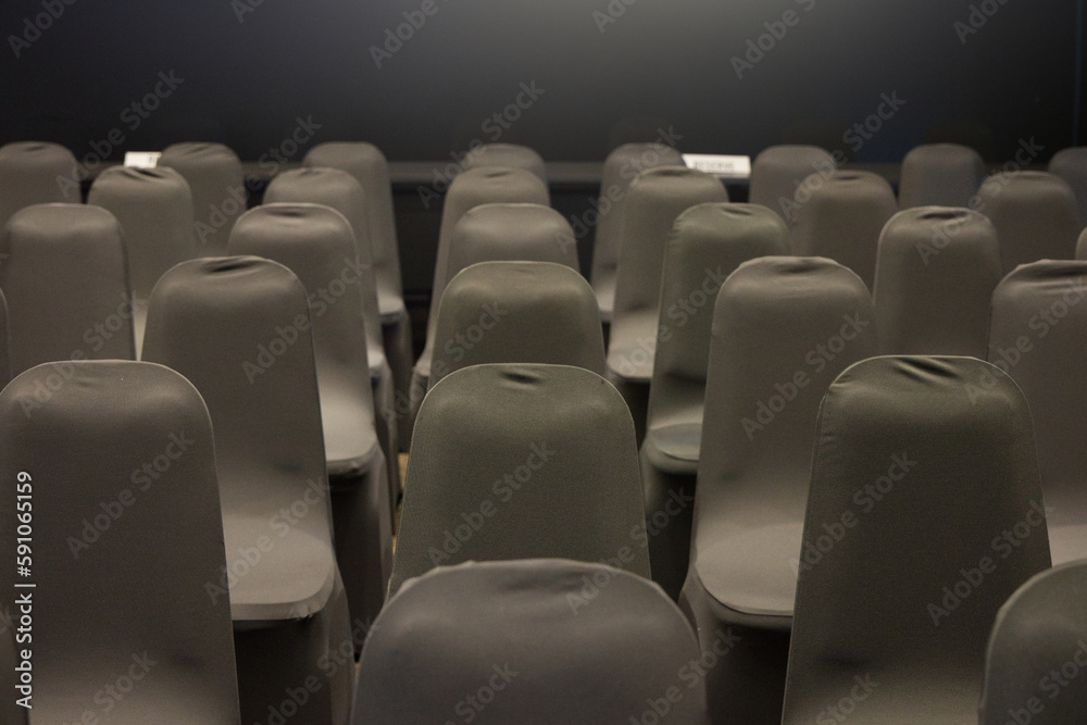 line up chairs color black in seminar room conference
