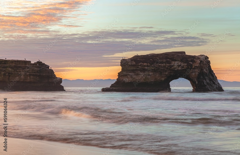 Fototapeta premium Natural Bridges State Beach during sunset in Santa Cruz, California