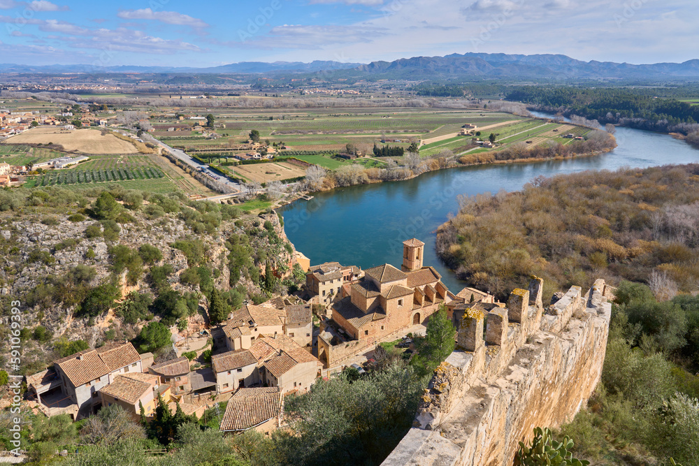 Village and knights templar castle of Miravet at the banks of river Ebro in Catalonia, Spain