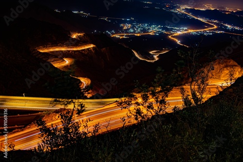 High-angle view of long exposure shots of lights over a highway at night