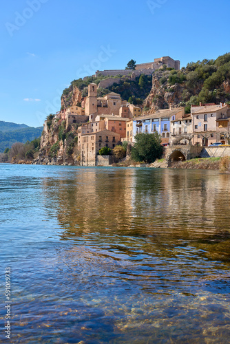 Village and knights templar castle of Miravet at the banks of river Ebro in Catalonia, Spain