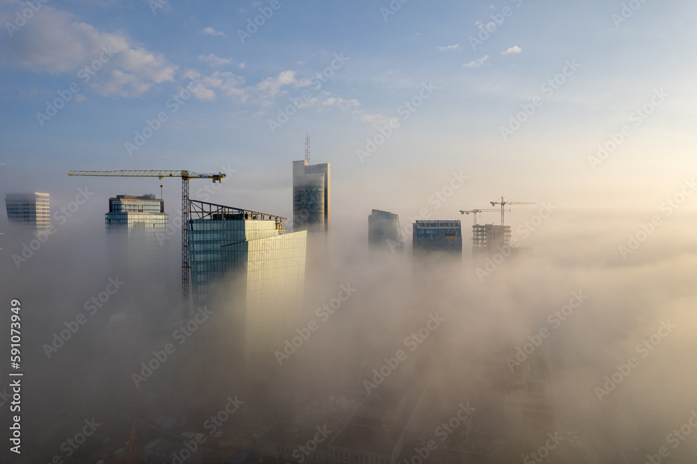 Aerial beautiful spring morning fog view of Vilnius business skyscraper downtown, Lithuania Aerial beautiful spring morning fog view of Vilnius business skyscraper downtown, Lithuania