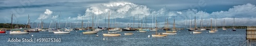 Panoramic shot of boats in a harbor
