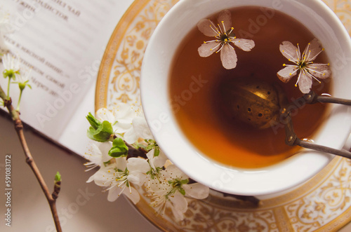 Cup of herbal tea with flower
