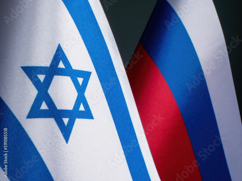 Flag of Israel next to the flag of Russia. photo