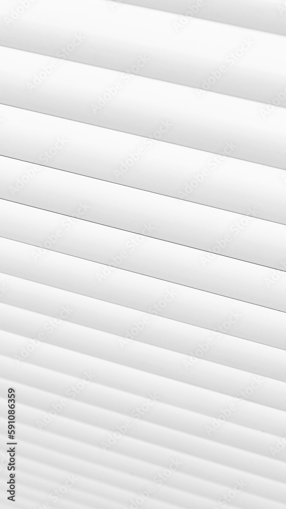 Vertical white blinds. Natural lighting. Window. Background Vertical white blinds. Natural lighting. Window. Background