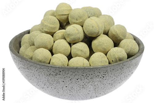 salmiak hagel candies in a concrete bowl isolated on white background photo