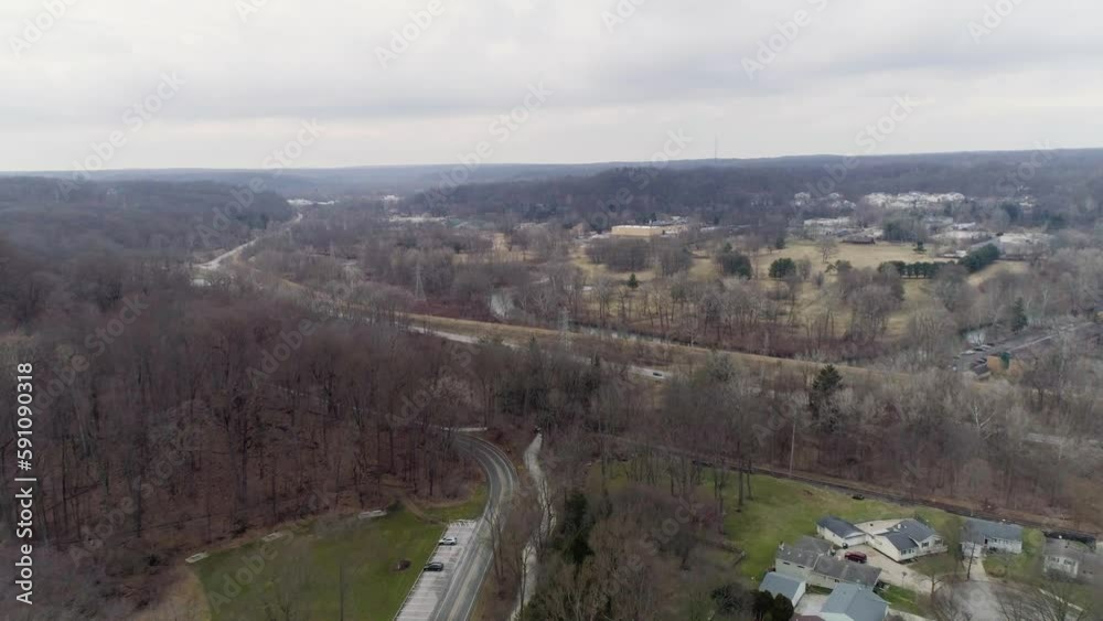 Drone of suburban Cuyahoga Valley Ohio during cold winter - approaching road Drone of suburban Cuyahoga Valley Ohio during cold winter - approaching road