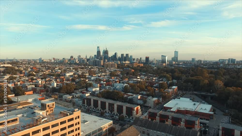 Philadelphia skyline drone from Brewerytown neighborhood on a warm sunny afternoon during golden hour - camera retreating Philadelphia skyline drone from Brewerytown neighborhood on a warm sunny afternoon during golden hour - camera retreating