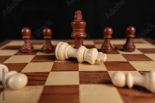 Chess, winning team, losing team, business strategy concept