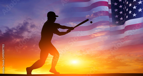 Baseball player on the background of the USA flag. American national game. photo