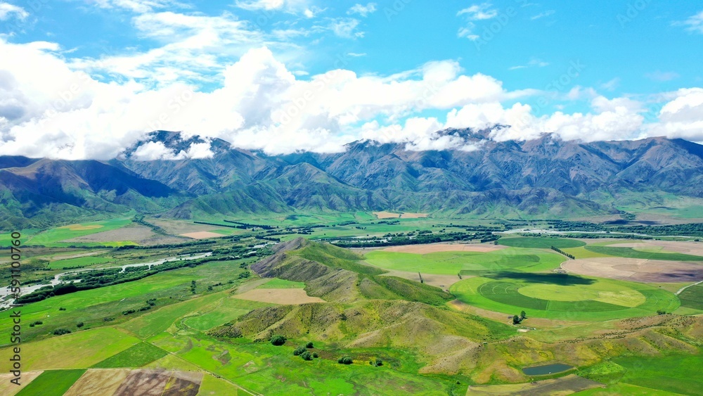 Beautiful aerial view of green mountainous landscape in summertime on daytime