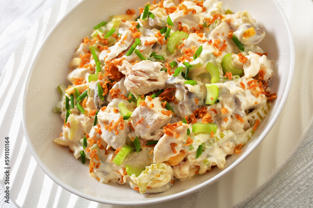 chicken salad with celery, mushrooms in bowl chicken salad with celery, mushrooms in bowl