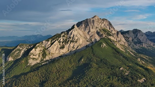 Aerial around view of Maglic Mountain in National park Sutjeska. The highest mountain of Bosnia and Herzegovina, beautiful landscape at sunset, 4k photo