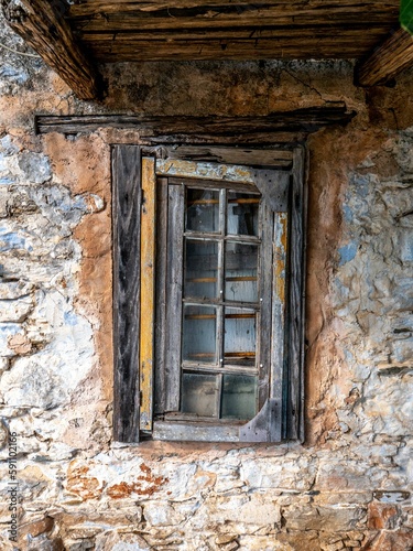 Old weathered wooden window © Selim Cayligil/Wirestock Creators