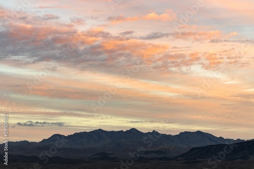 Lake Mead National Recreation Area surrounded by mountains during sunset, Las Vegas, Nevada © James Marvin Phelps/Wirestock Creators