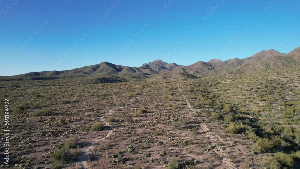 Drone shot over Arizona desert mountains on a sunny day Drone shot over Arizona desert mountains on a sunny day